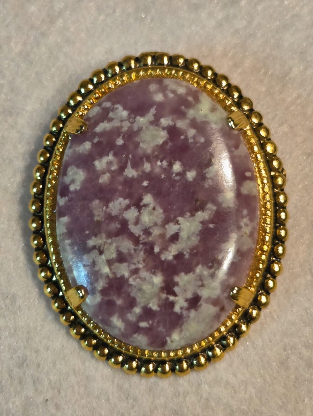 Gold-Trim Purple Stone Oval Brooch